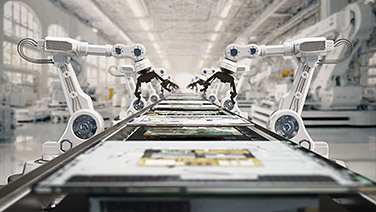 Robotica avanzata che opera in una catena di montaggio ad alta tecnologia.